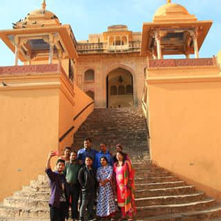 A Indian family taking photos at Amber Fort