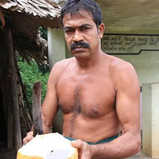 Man with coconut